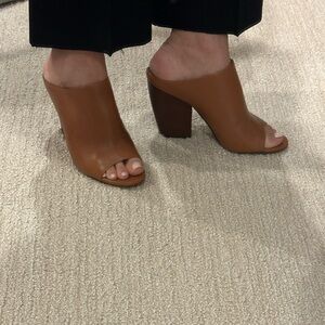 Brown leather peep toe mules